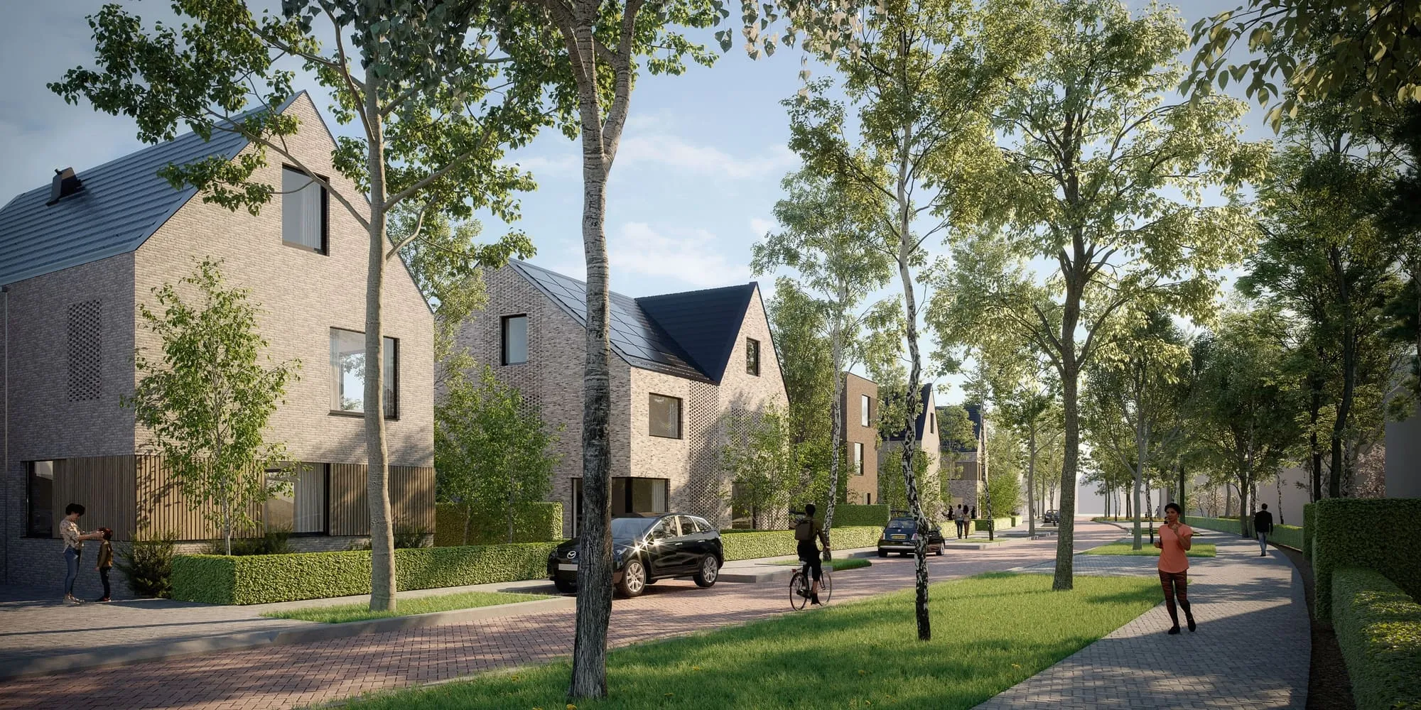 Heidestad Ede, laan met huizen en bomen met fietsers en auto's