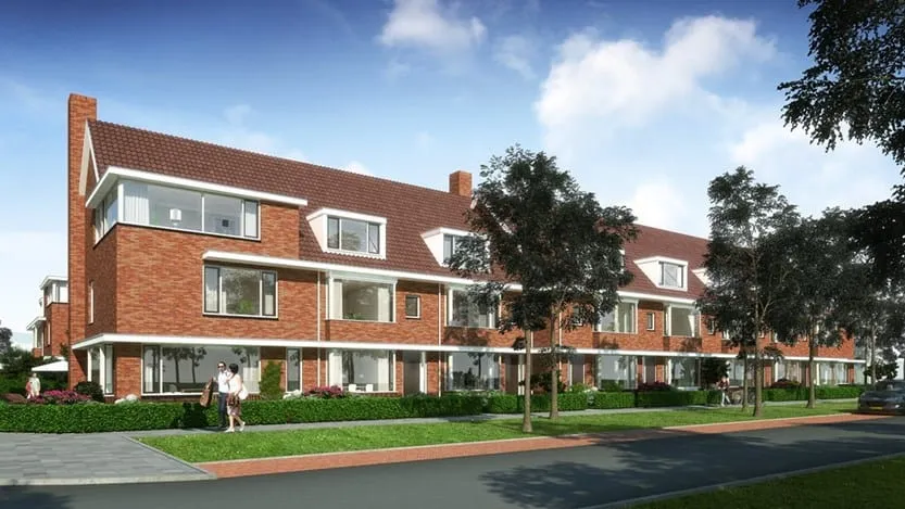 Rijtjeshuizen in een nieuwbouwwijk met groen en bomen